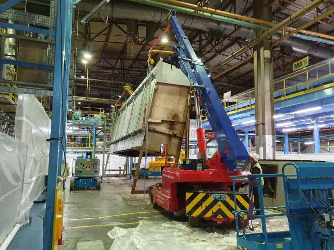 Automotive industry manufacturing equipment relocation and machinery moving project.